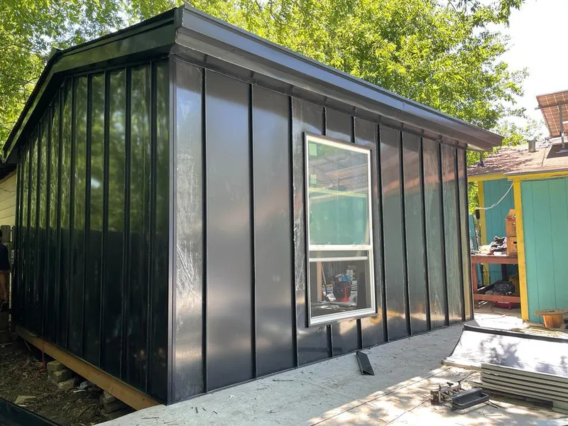 Black standing seam metal wall panels for Metal Roof Installation in Fair Lakes